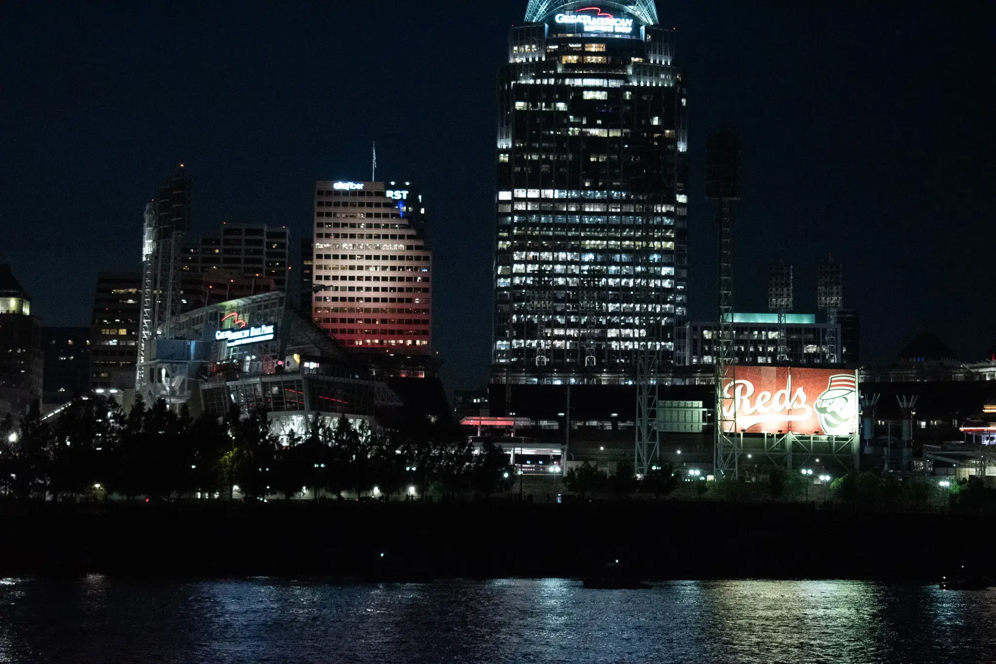 Downtown Cincinnati skyline at night seen from the Ohio River