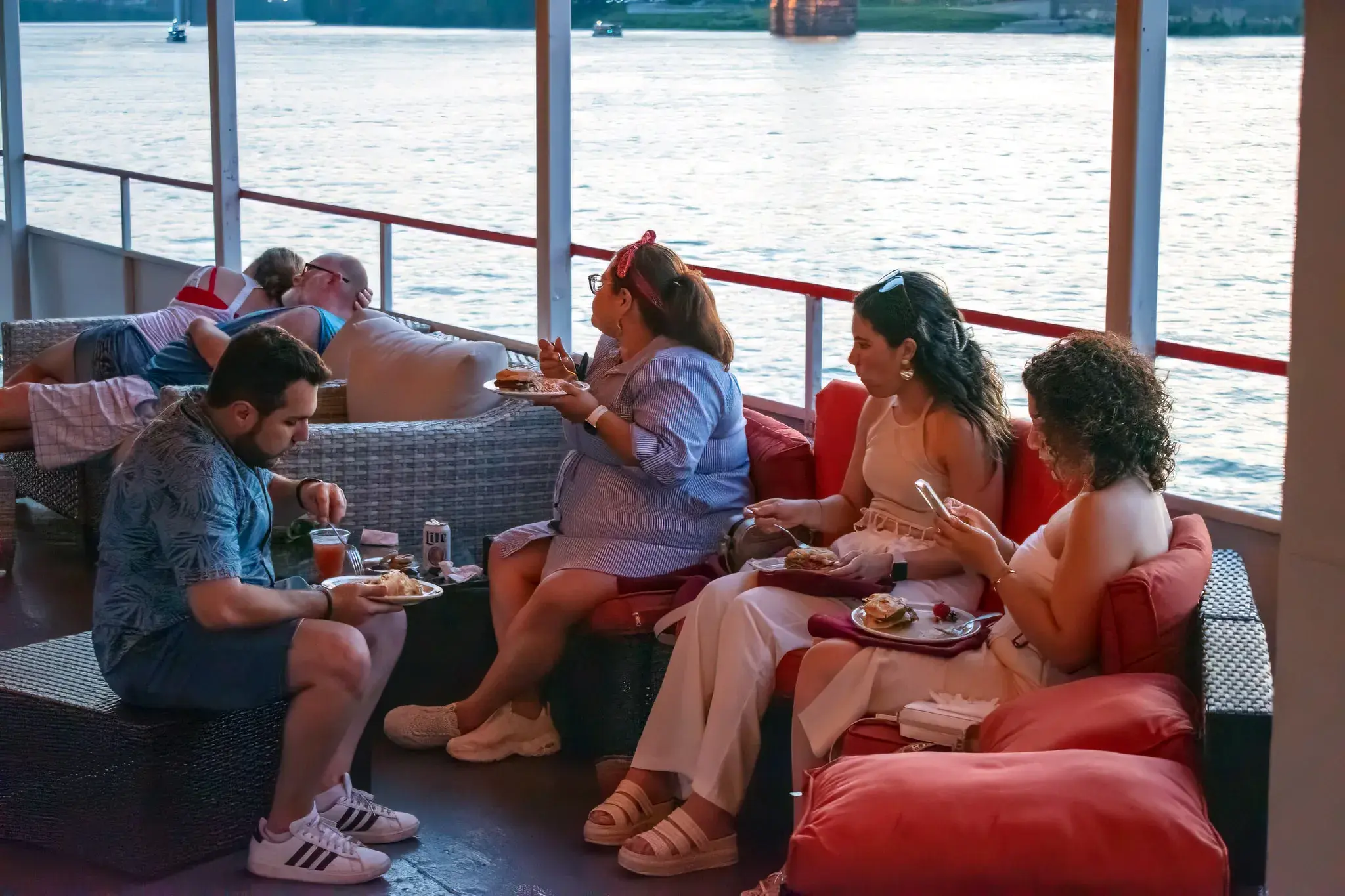 Guests dining in the open-air top deck lounge on the Ohio River